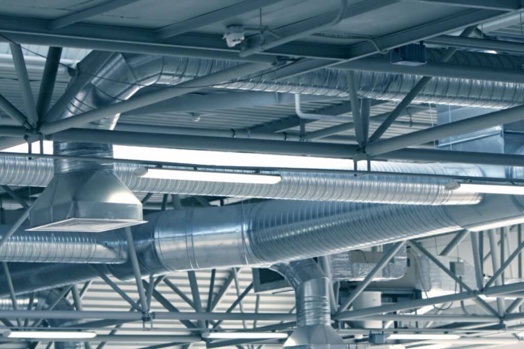 Industrial air ducts and ventilation system indoors.